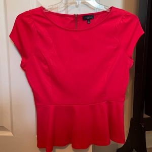 Coral peplum top from the Limited
